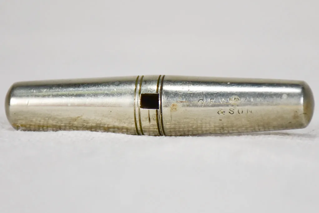 Early 20th century travel bottle opener in tapered case