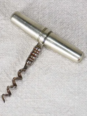 Early 20th century travel bottle opener in tapered case