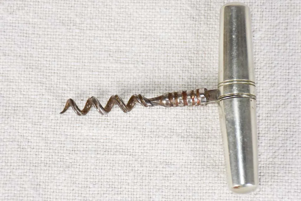 Early 20th century travel bottle opener in tapered case