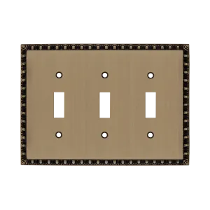 Egg & Dart Switch Plate with Triple Toggle in Antique Brass