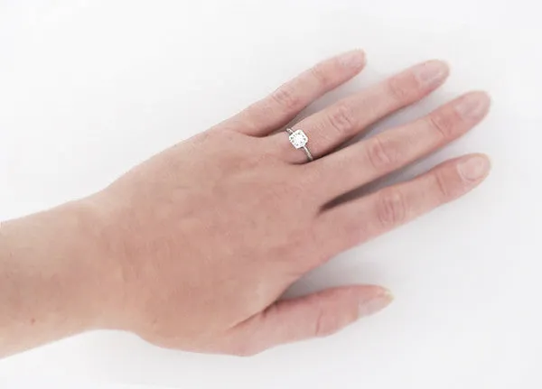 Filigree Scrolls Engraved White Sapphire Engagement Ring in Platinum