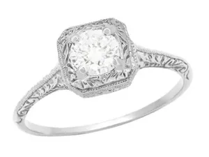 Filigree Scrolls Engraved White Sapphire Engagement Ring in Platinum