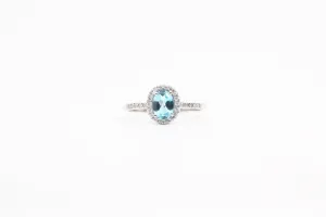 White Gold Blue Topaz and Diamond Halo Ring